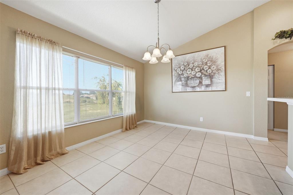 17083 Southeast 115th Terrace Road Summerfield, FL 34491 - Photo 18 of 61 a view of an empty room with a window