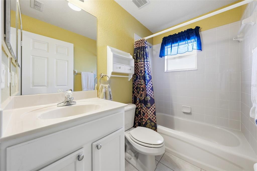17083 Southeast 115th Terrace Road Summerfield, FL 34491 - Photo 32 of 61 a bathroom with a sink a toilet and a bathtub