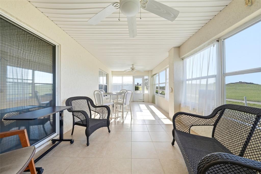 17083 Southeast 115th Terrace Road Summerfield, FL 34491 - Photo 34 of 61 a living room with furniture and a large window