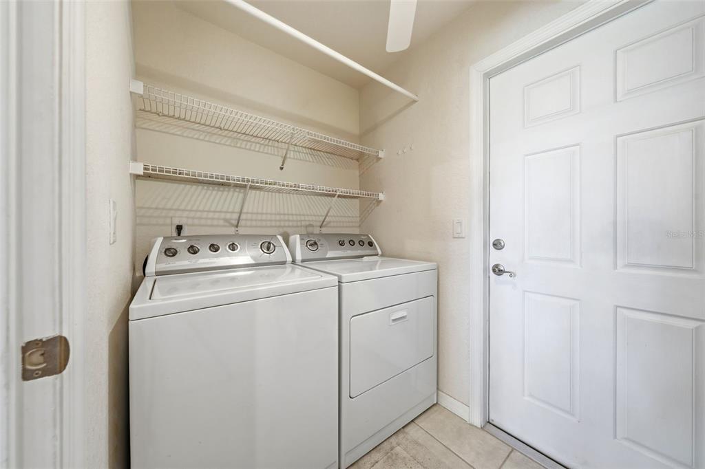 17083 Southeast 115th Terrace Road Summerfield, FL 34491 - Photo 36 of 61 a utility room with dryer and washer