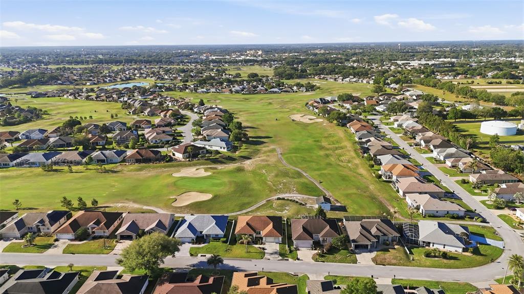 17083 Southeast 115th Terrace Road Summerfield, FL 34491 - Photo 44 of 61 an aerial view of residential building and lake