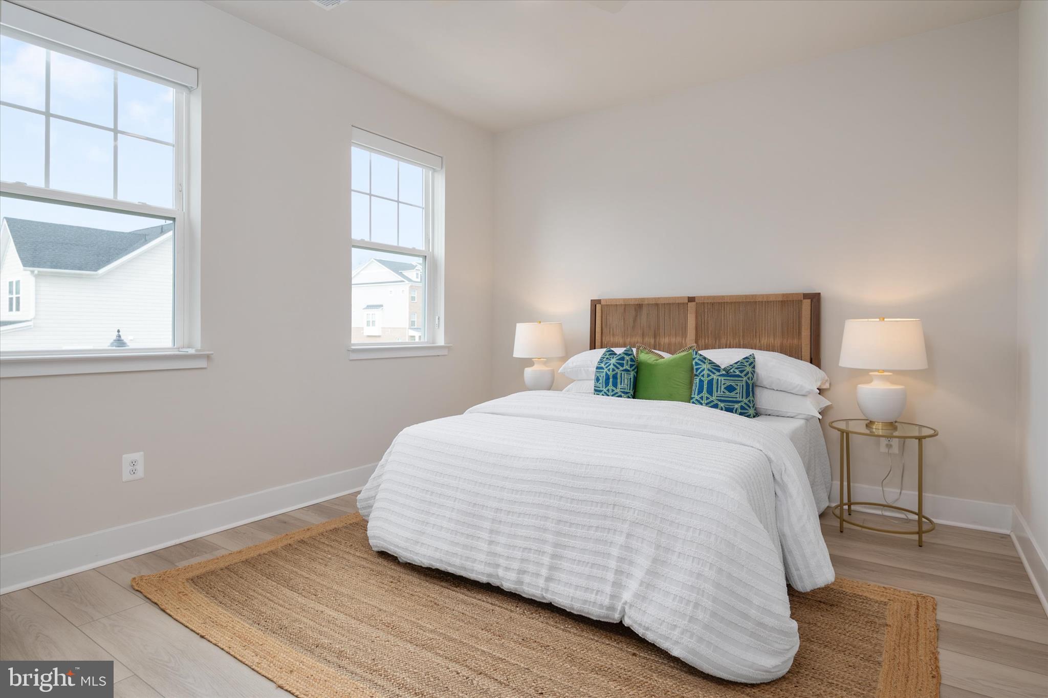 143 Stilly Way Annapolis, MD 21403 - Photo 20 of 60 a bedroom with a bed and window