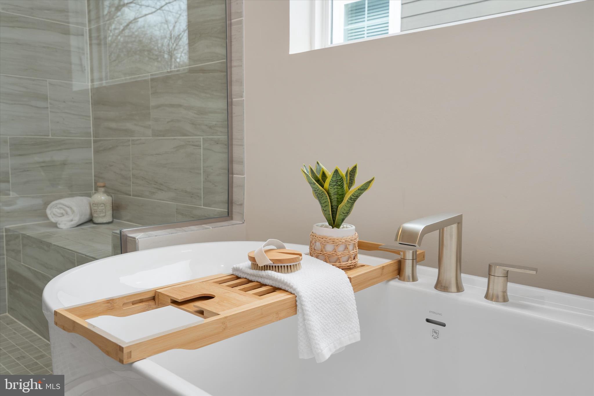 143 Stilly Way Annapolis, MD 21403 - Photo 30 of 60 a bedroom with a bed and a potted plant