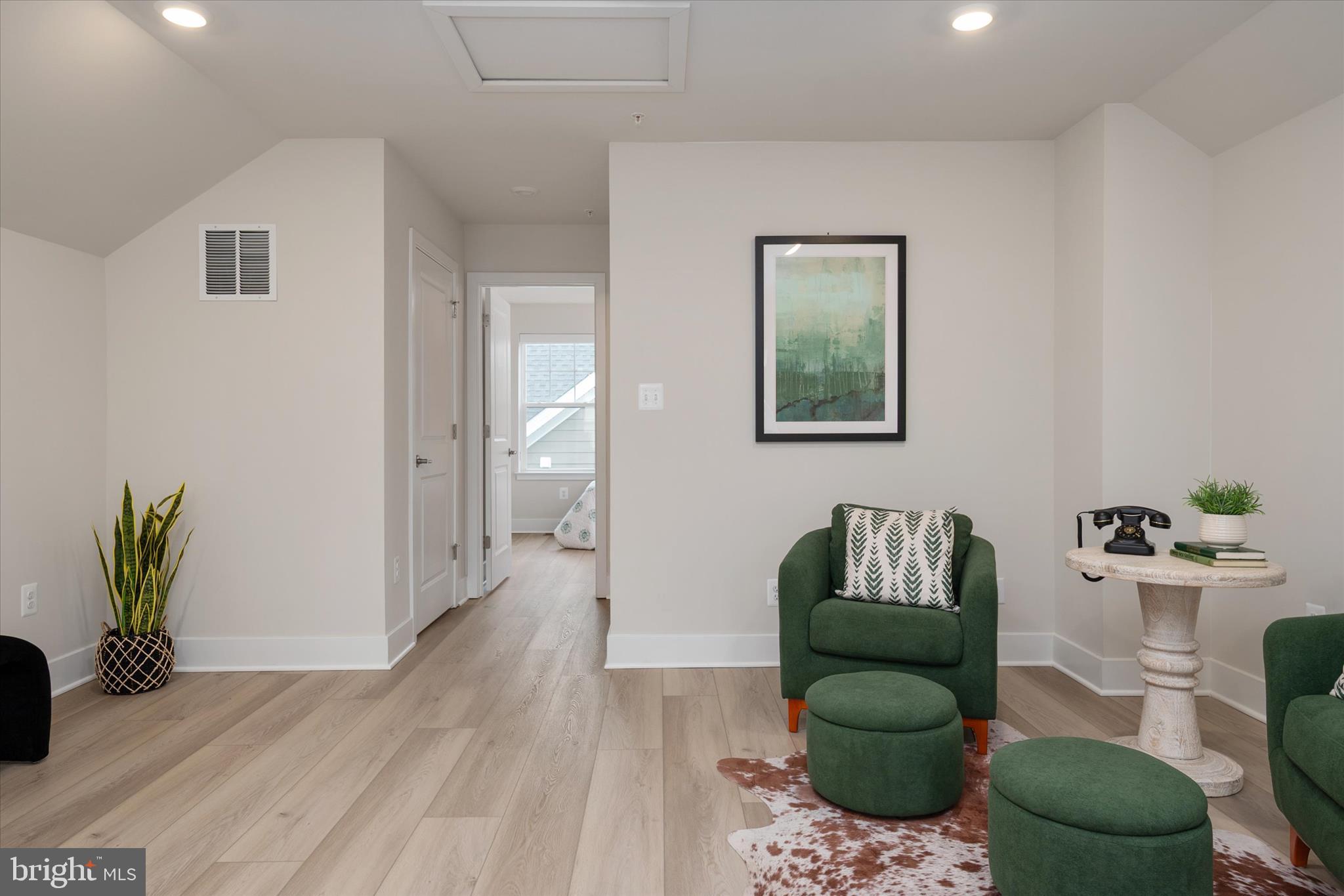 143 Stilly Way Annapolis, MD 21403 - Photo 33 of 60 a living room with furniture and wooden floor
