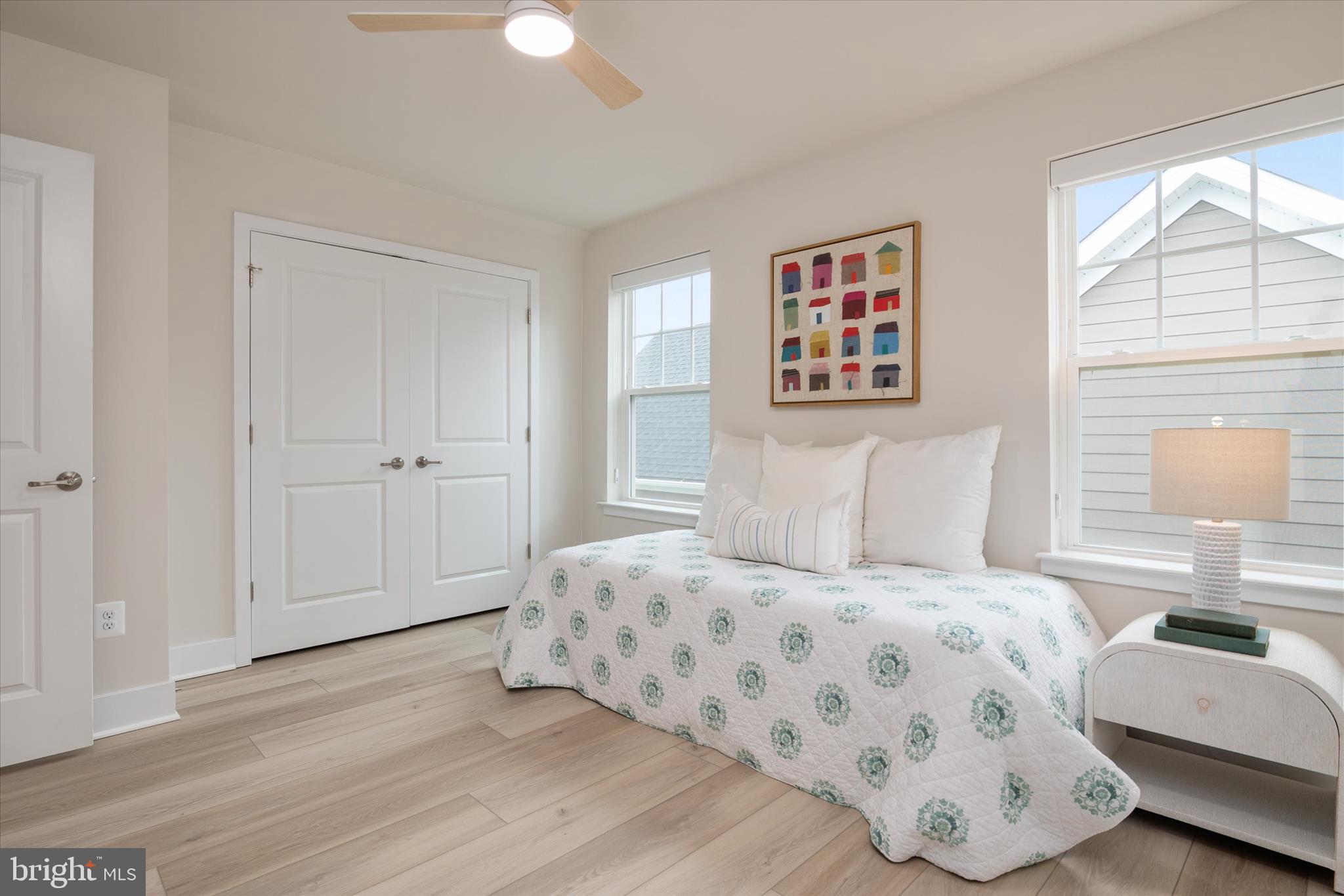 143 Stilly Way Annapolis, MD 21403 - Photo 34 of 60 a bedroom with a bed and a painting on the wall