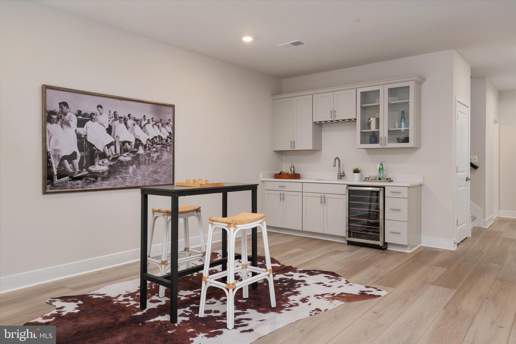 143 Stilly Way Annapolis, MD 21403 - Photo 40 of 60 a view of a kitchen with dining table and chairs