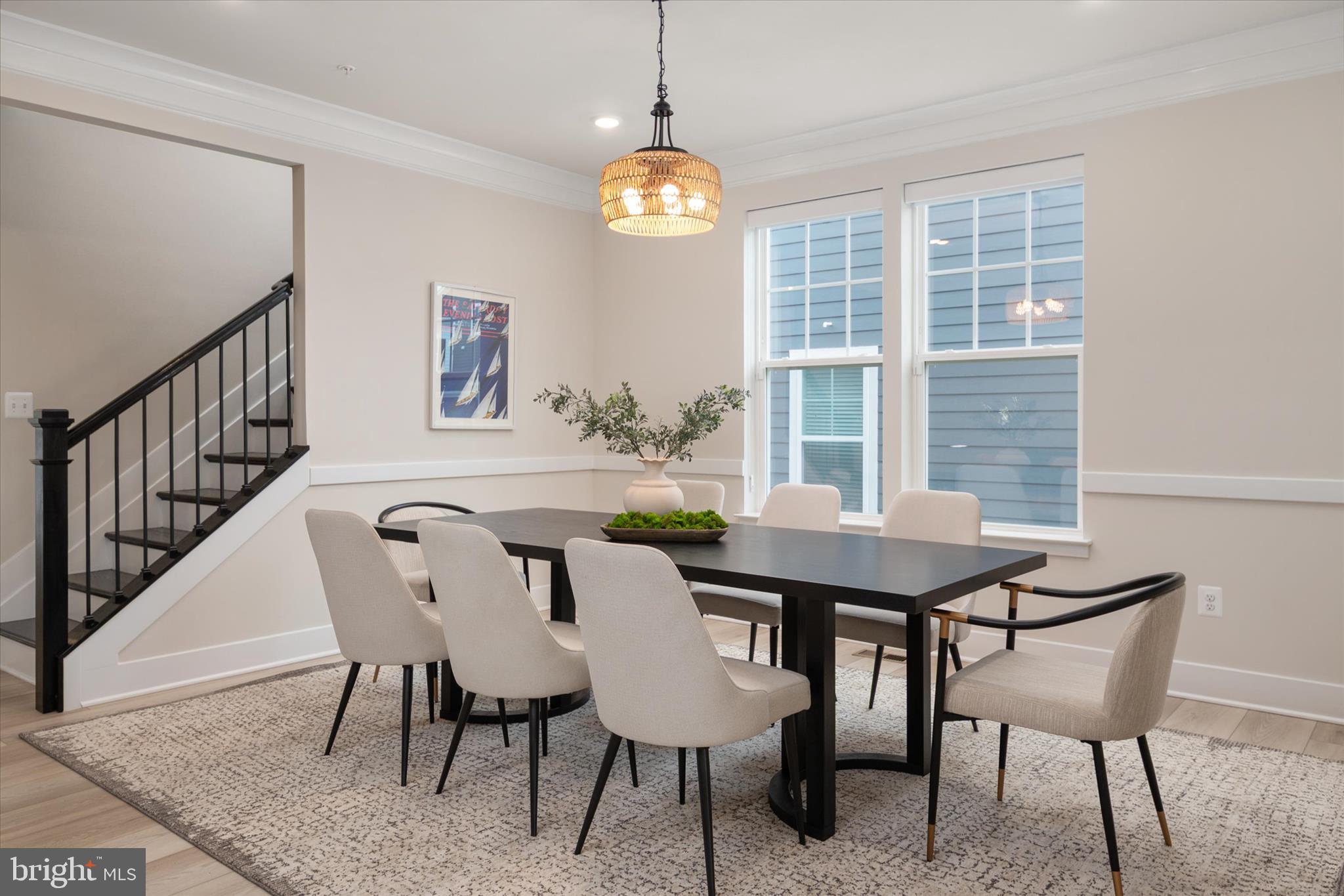 143 Stilly Way Annapolis, MD 21403 - Photo 4 of 60 a view of a dining room with furniture window and wooden floor