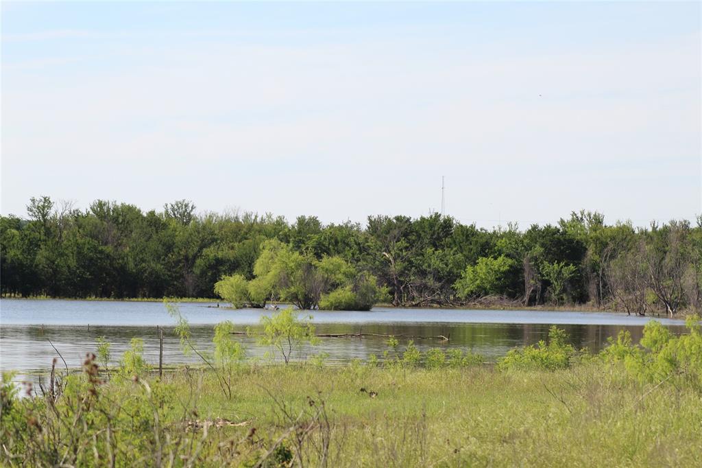 2077 B Shawver Road Jacksboro, TX 76458 - Photo 6 of 16 Water view featuring a heavily wooded area