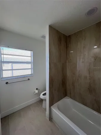 a view of a livingroom with furniture and garage