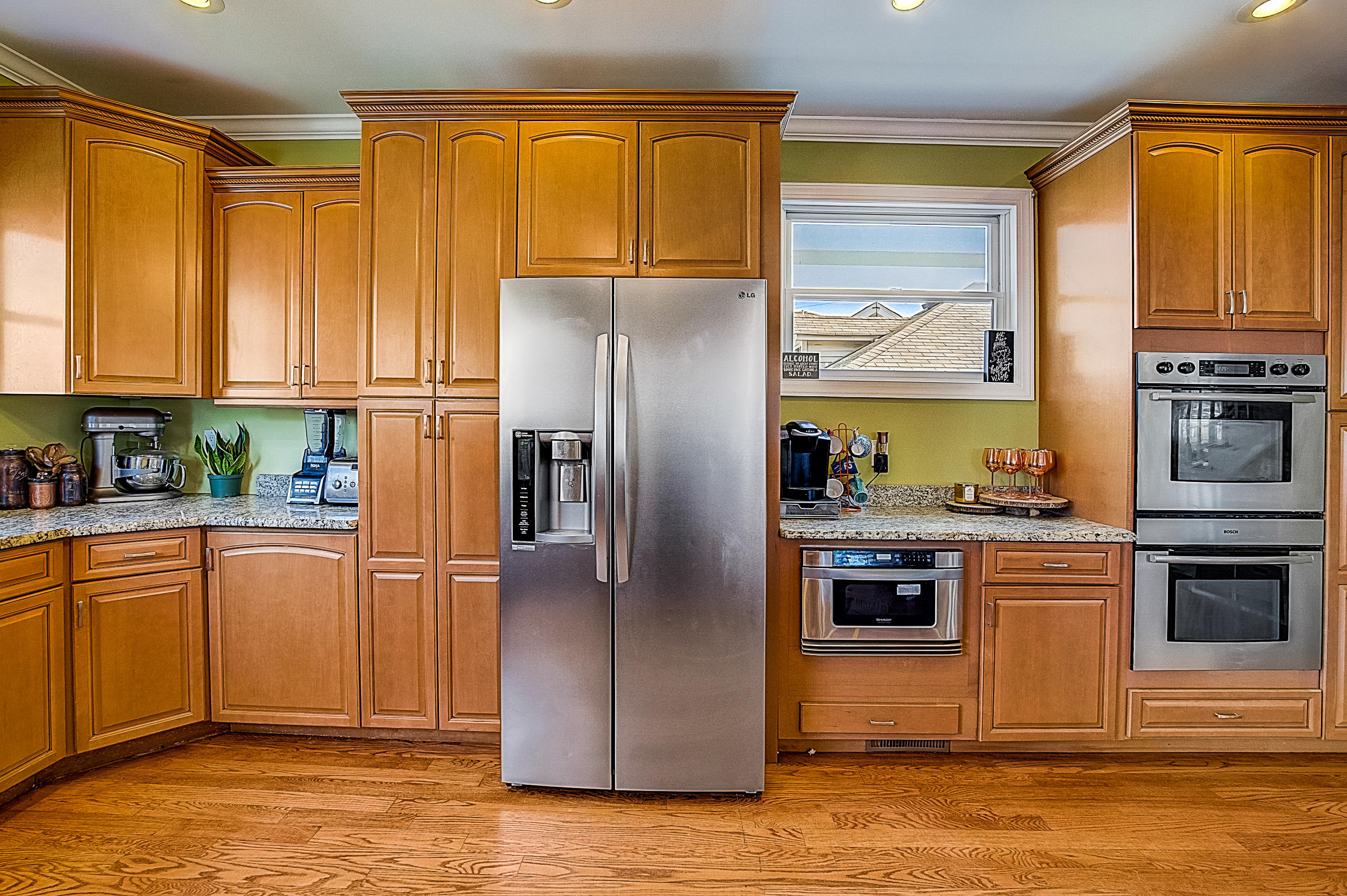 286 Main Street Middletown, NJ 07758 - Photo 24 of 69 a kitchen with stainless steel appliances granite countertop a refrigerator a stove and a sink with large window