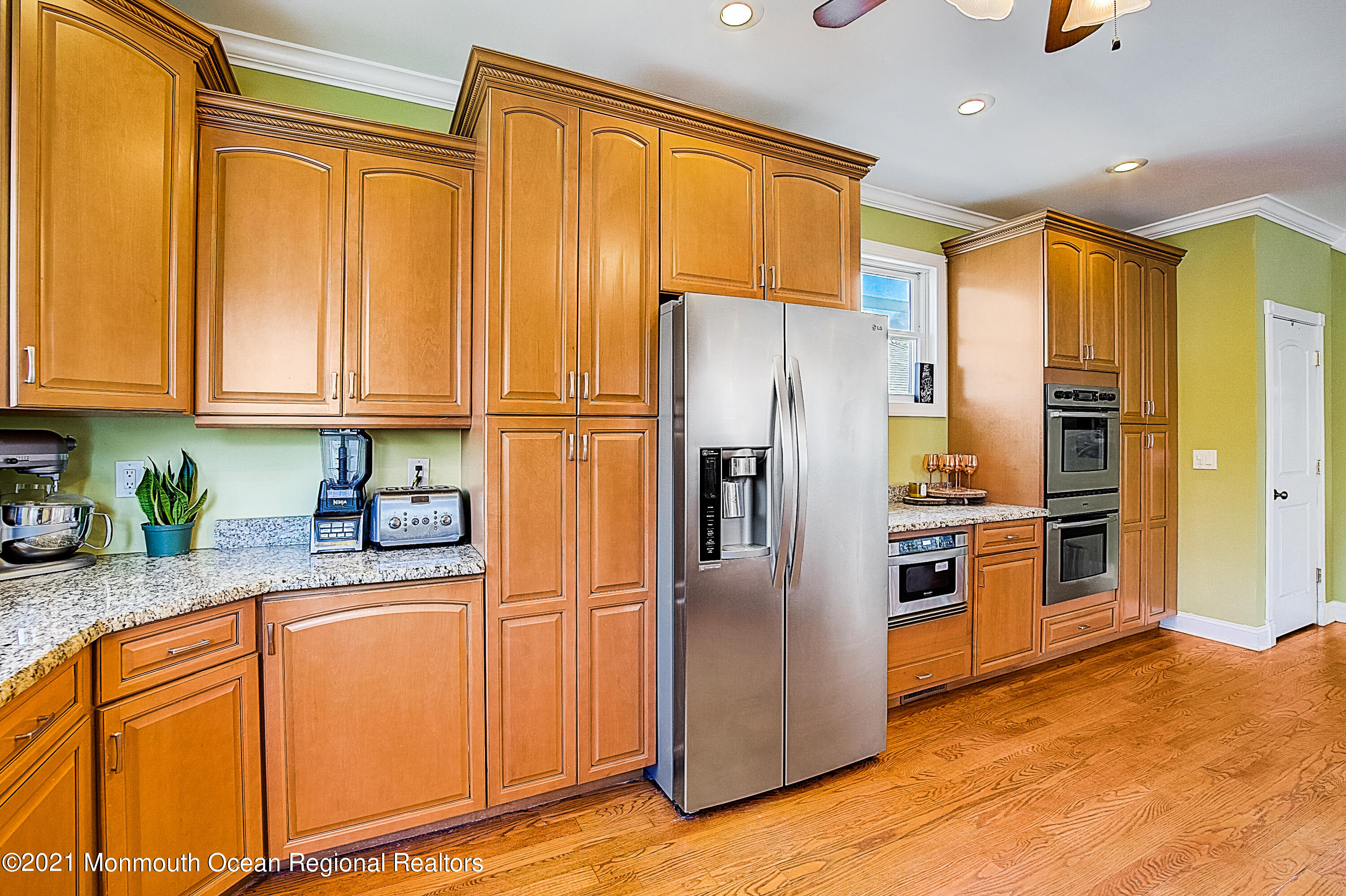 286 Main Street Middletown, NJ 07758 - Photo 27 of 69 a kitchen with stainless steel appliances granite countertop a refrigerator a stove and a sink