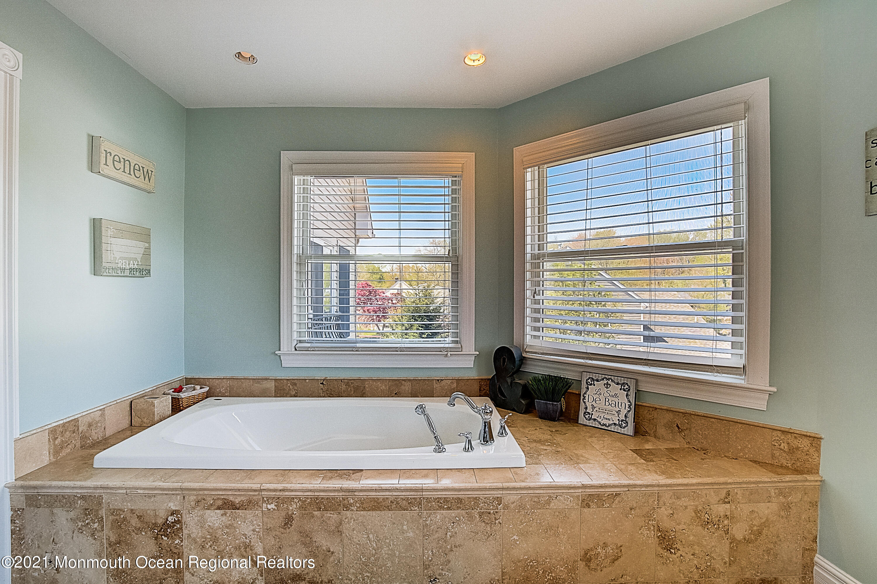 286 Main Street Middletown, NJ 07758 - Photo 40 of 69 a bathroom with a bathtub and window