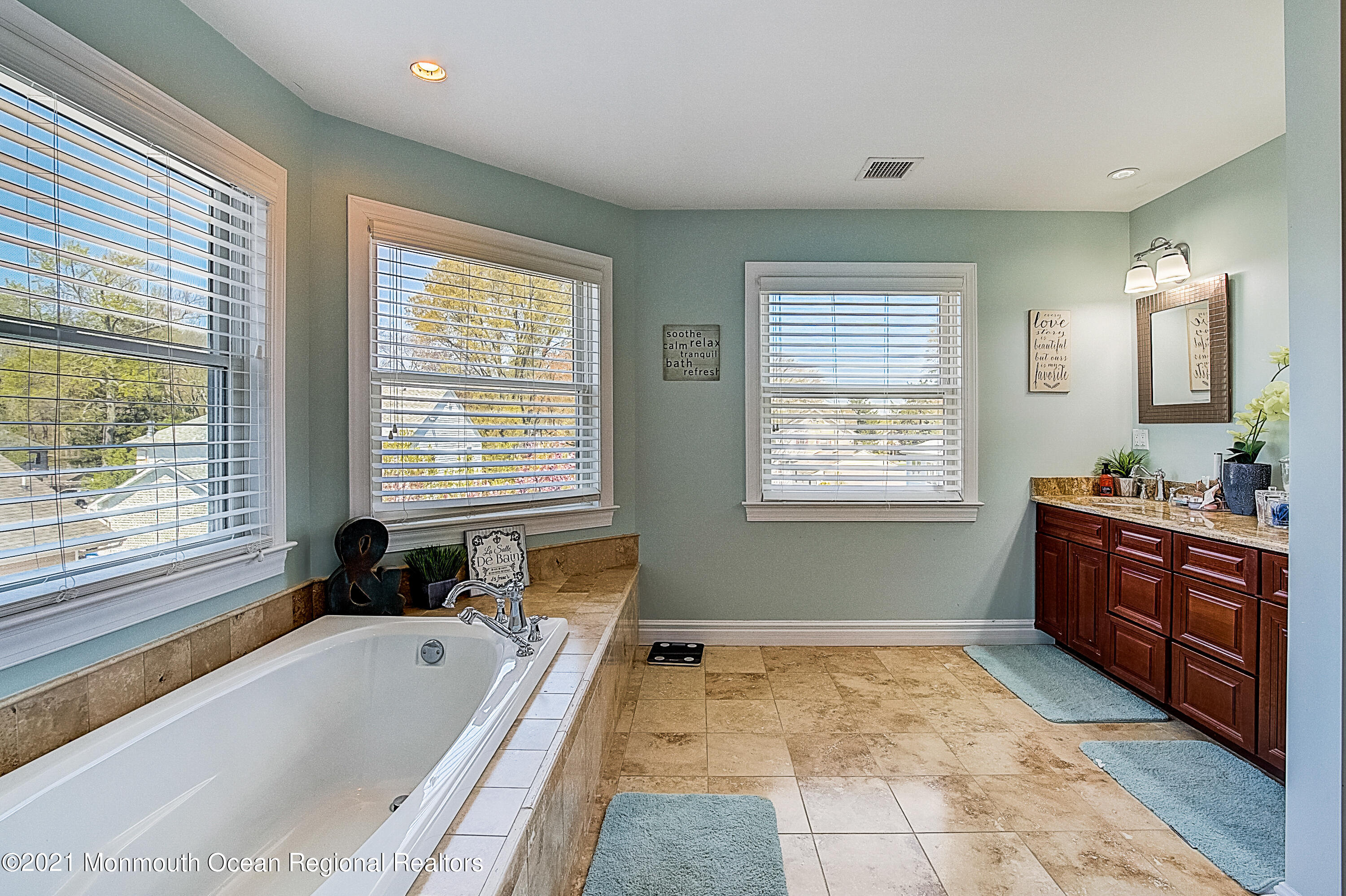 286 Main Street Middletown, NJ 07758 - Photo 42 of 69 a bathroom with a granite countertop tub sink and a bathtub