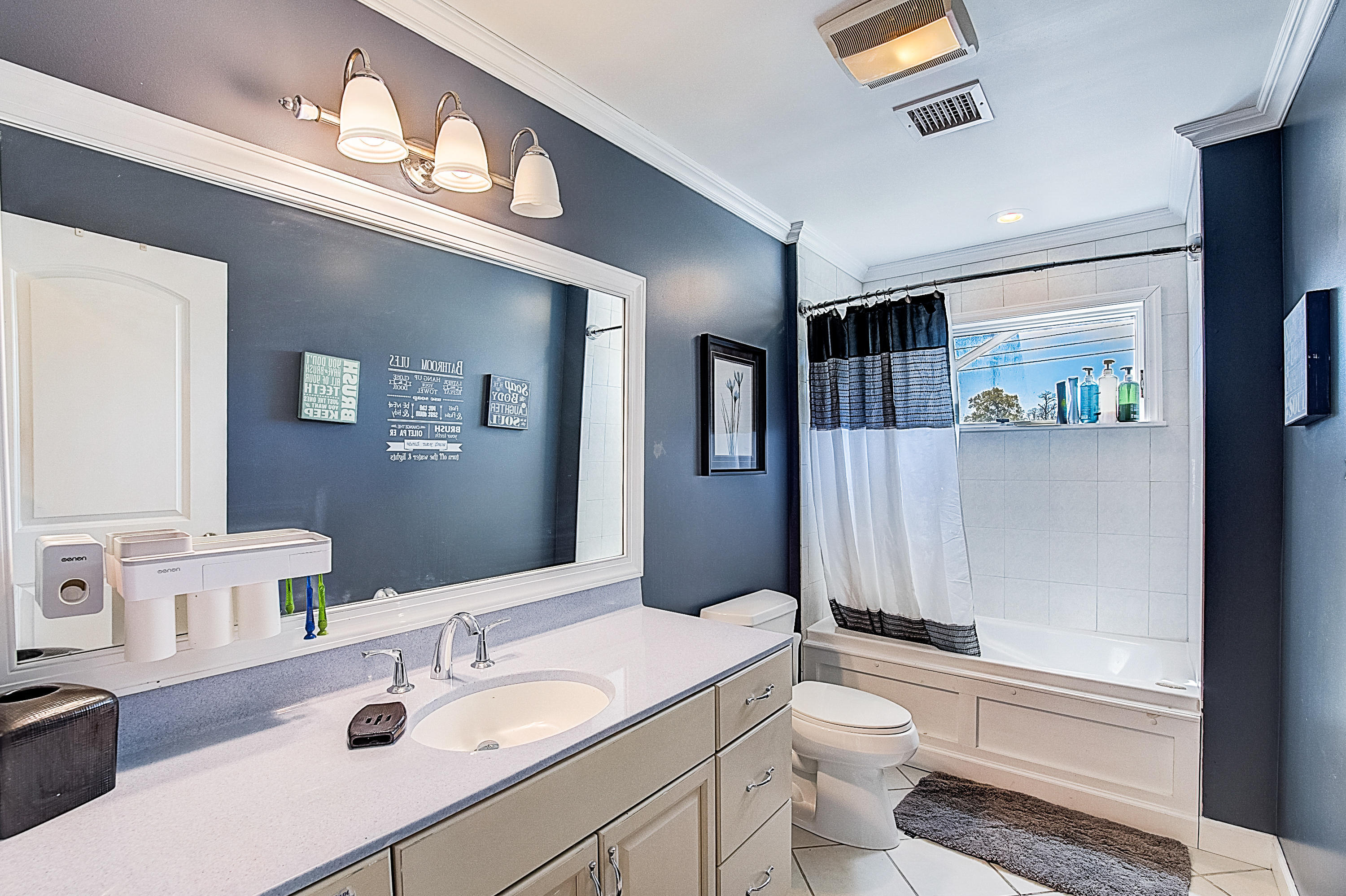 286 Main Street Middletown, NJ 07758 - Photo 46 of 69 a bathroom with a sink a toilet and shower