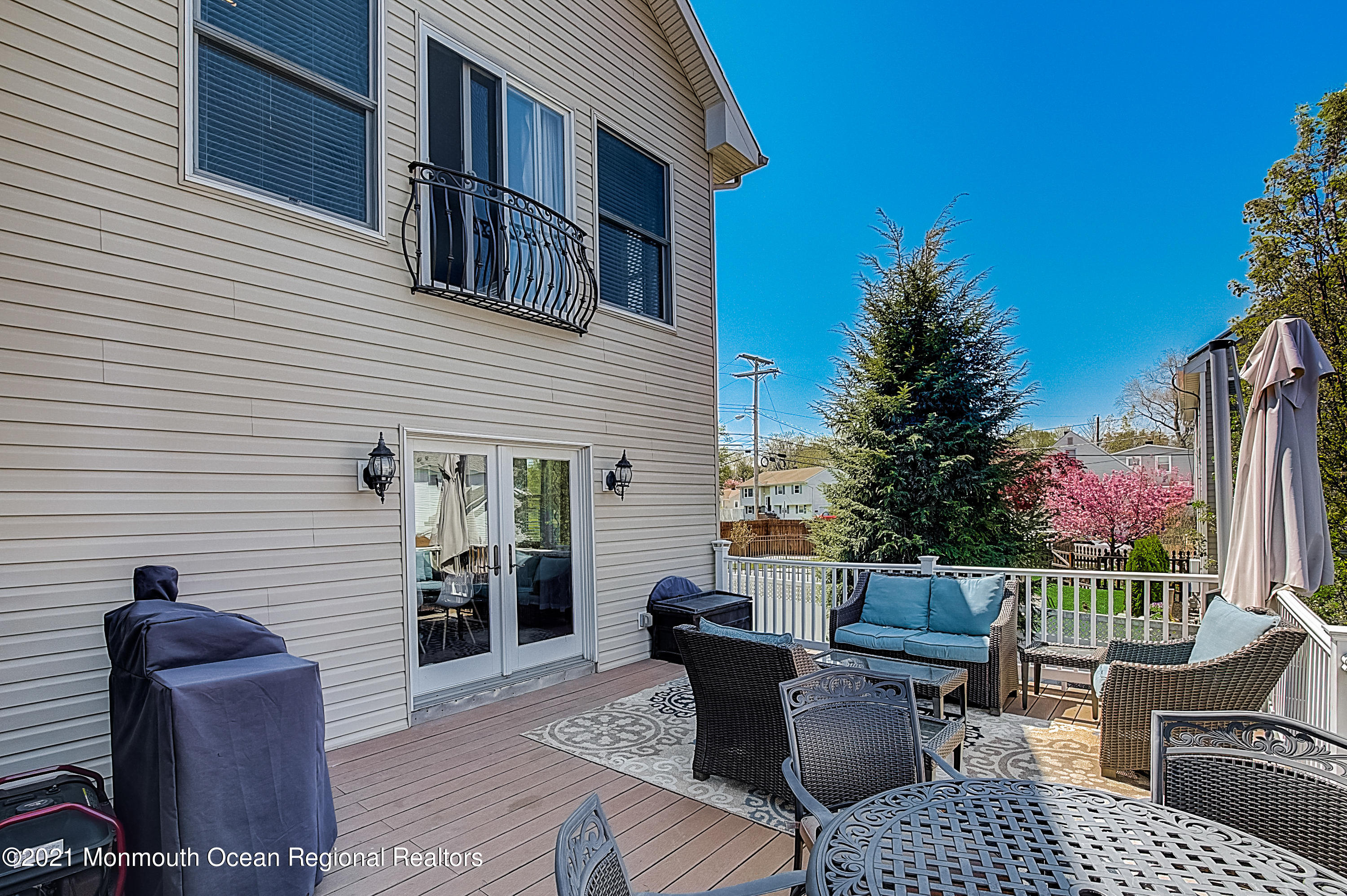 286 Main Street Middletown, NJ 07758 - Photo 63 of 69 a view of a patio with couches chairs and potted plants