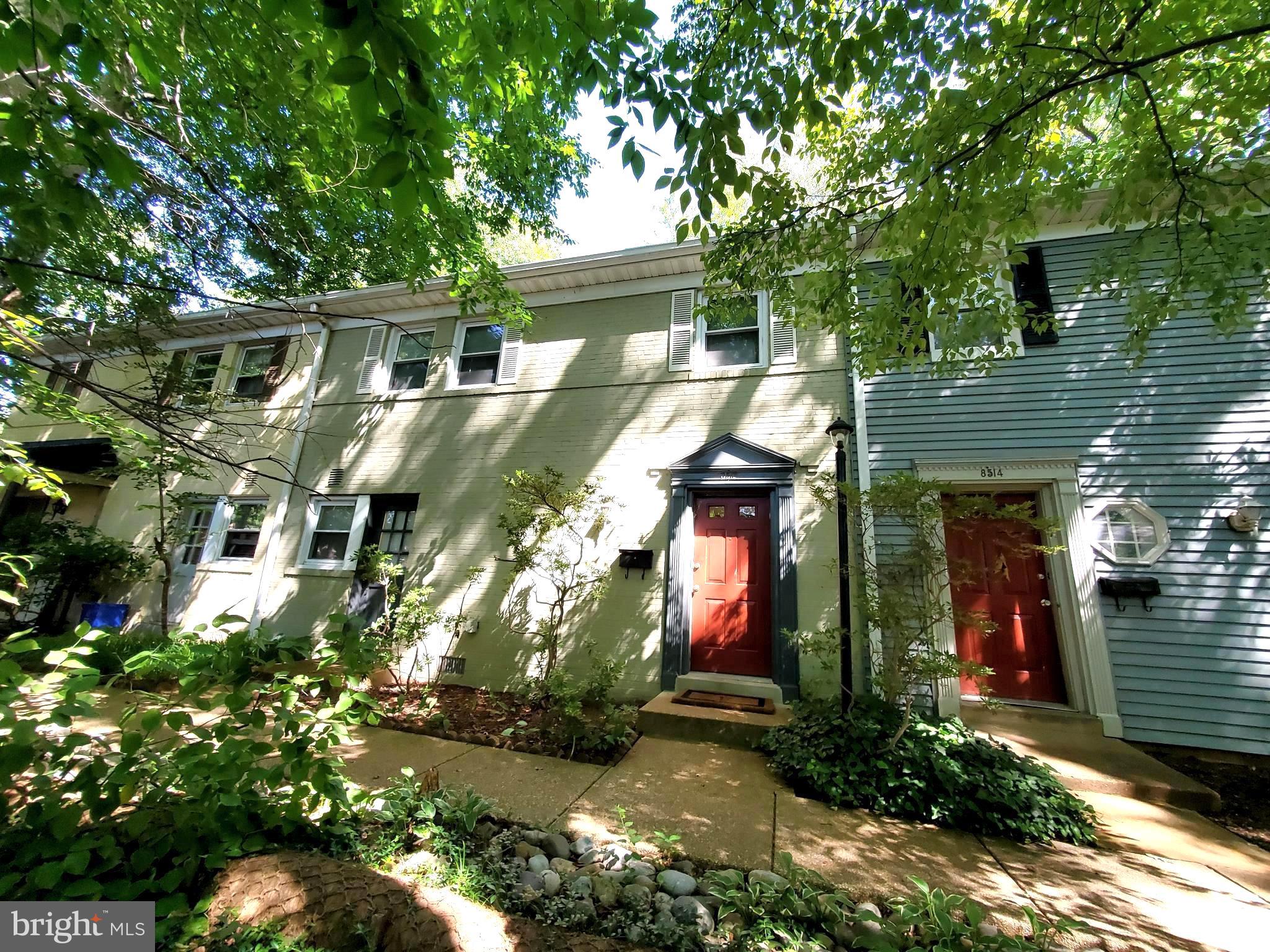 8512-12-2 Manchester Road, Unit 122 Silver Spring, MD 20901 - Photo 4 of 40 Facade dappled in Sunlight