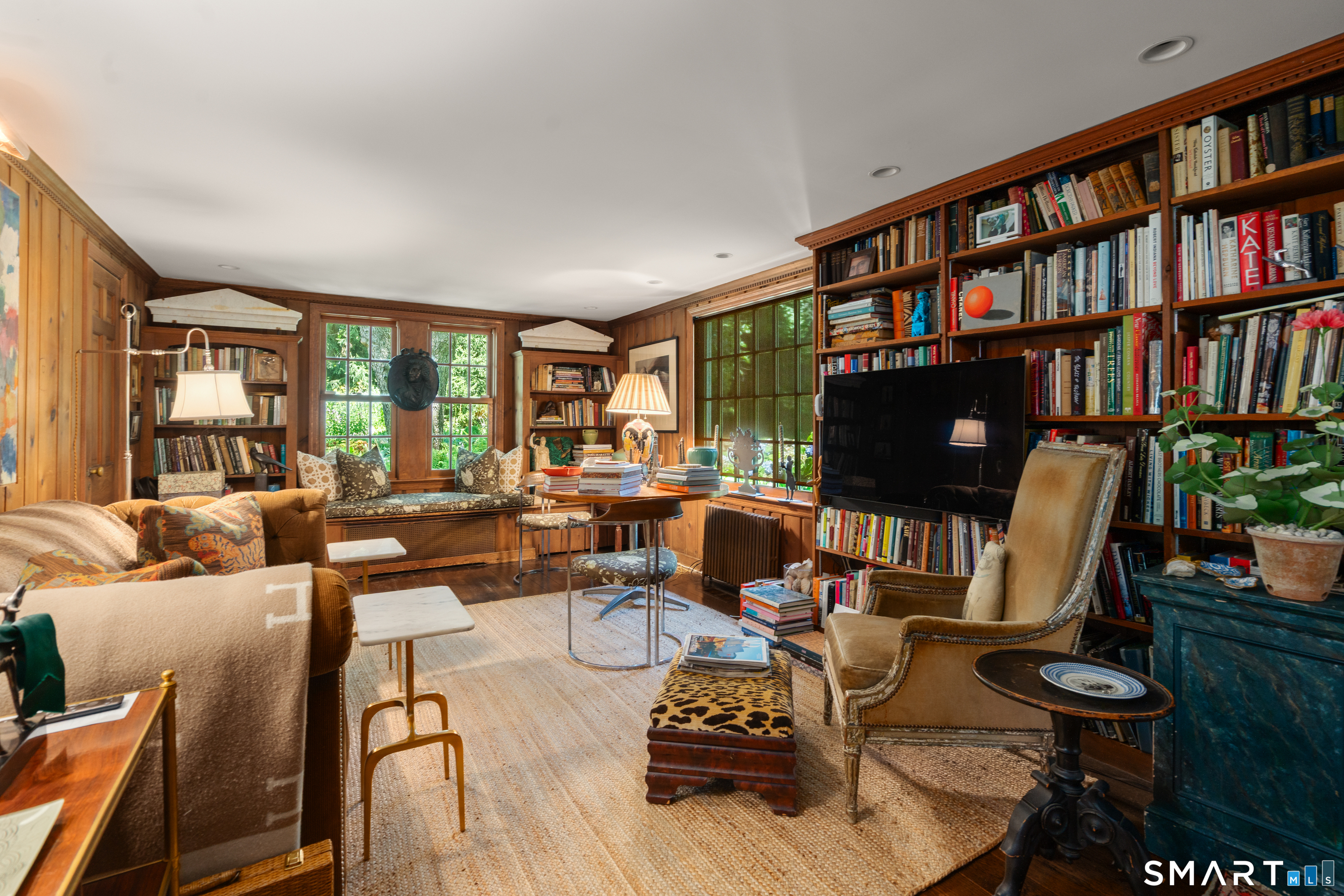 60 Old Saugatuck Road Norwalk, CT 06855 - Photo 18 of 40 Library with window seat, bookcases and full bath