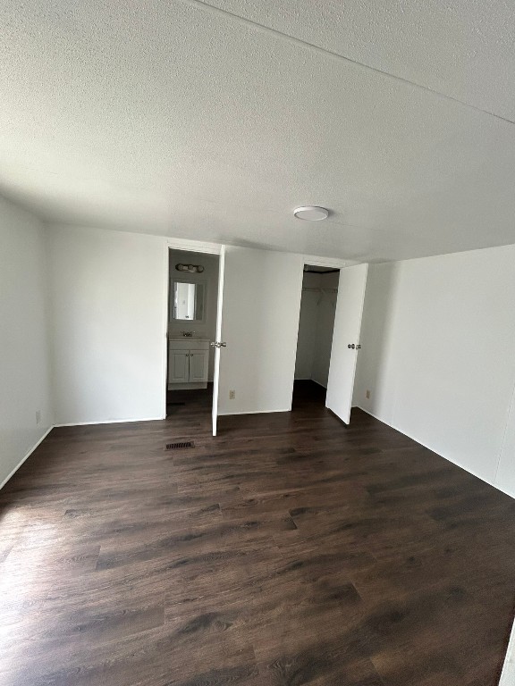 1406 East Wallisville Road Highlands, TX 77562 - Photo 14 of 26 a view of an empty room with wooden floor and closet