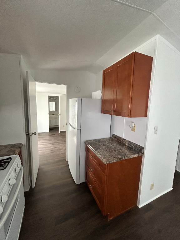 1406 East Wallisville Road Highlands, TX 77562 - Photo 15 of 26 a kitchen with stainless steel appliances granite countertop a sink stove and refrigerator