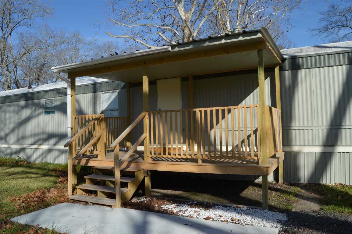 1406 East Wallisville Road Highlands, TX 77562 - Photo 9 of 26 a view of deck with a patio