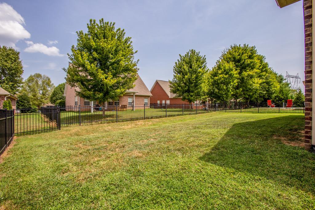 5012 Geranium Drive Spring Hill, TN 37174 - Photo 24 of 26 a house view with swimming pool in front of it
