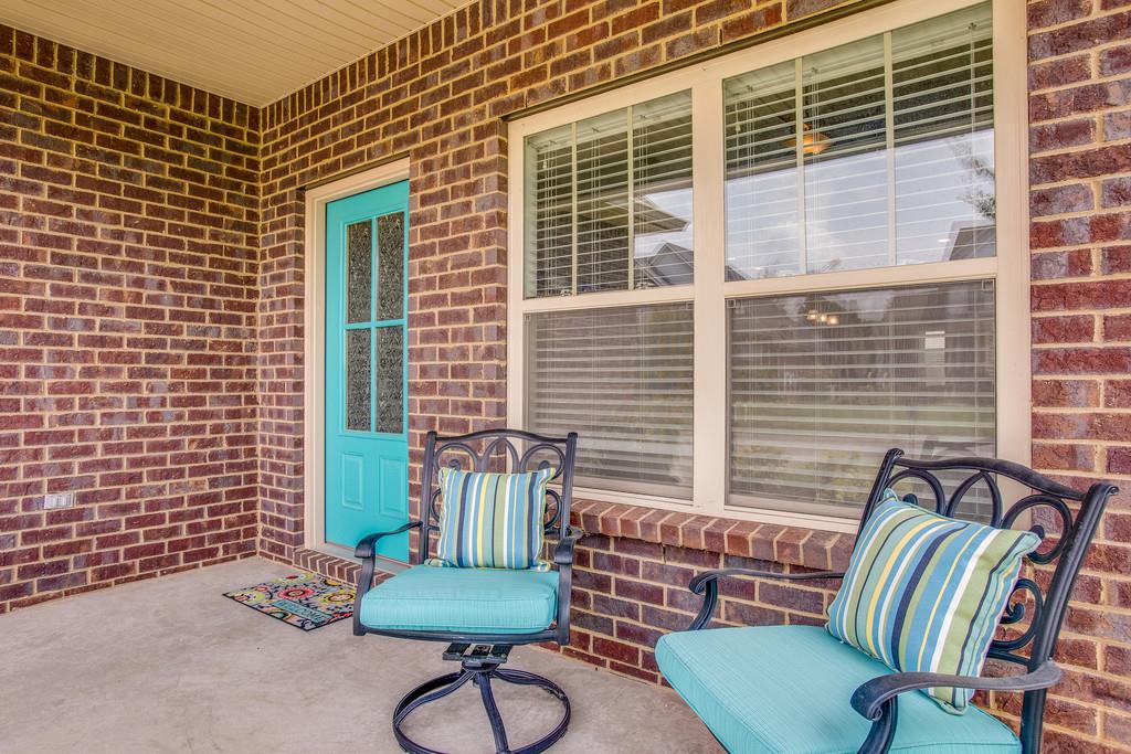 5012 Geranium Drive Spring Hill, TN 37174 - Photo 3 of 26 a view of balcony with chairs and a potted plant