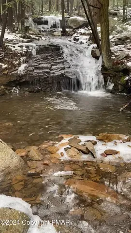 a view of outdoor space water and mountain view