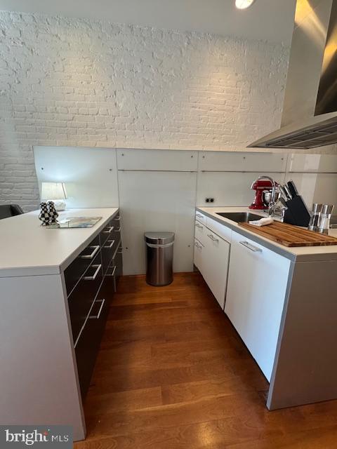 3336 Cady's Alley Northwest, Unit 201 Washington, DC 20007 - Photo 32 of 34 a kitchen with sink cabinets and stove top oven