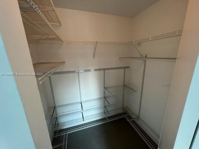 Edgewater Miami, FL 33137 - Photo 13 of 65 a view of a room with racks on the wall