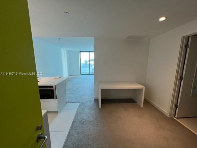 Edgewater Miami, FL 33137 - Photo 3 of 65 a bathroom with a toilet tub and a sink