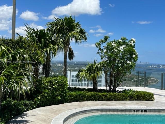 Edgewater Miami, FL 33137 - Photo 33 of 65 a front view of a house with garden