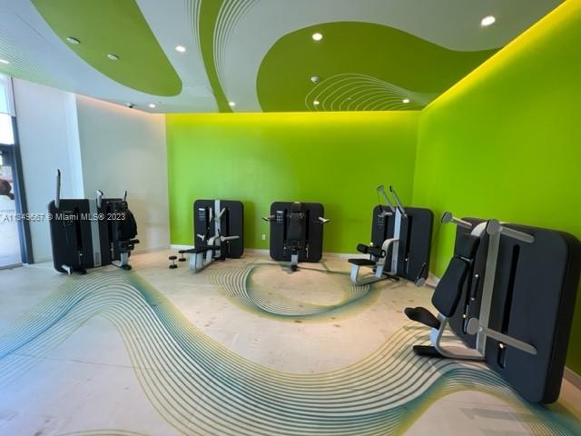 Edgewater Miami, FL 33137 - Photo 51 of 65 a bathroom with a sink and mirror