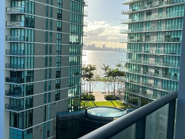 Edgewater Miami, FL 33137 - Photo 8 of 65 a view of a balcony with a floor and next to a building