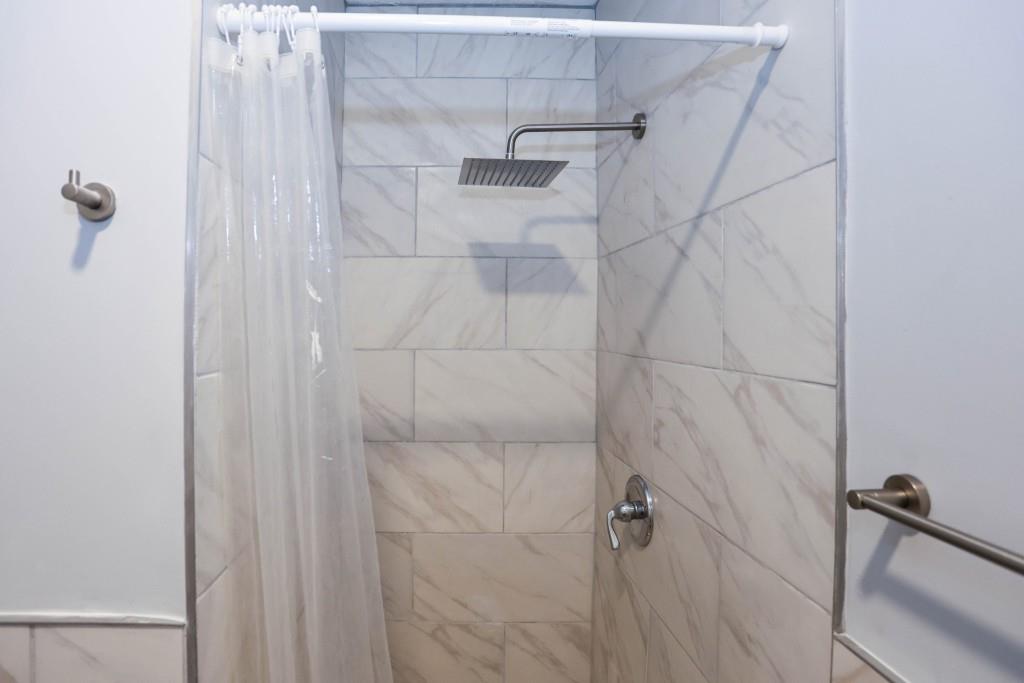 1508 Peachcrest Road Decatur, GA 30032 - Photo 18 of 26 a bathroom with a shower