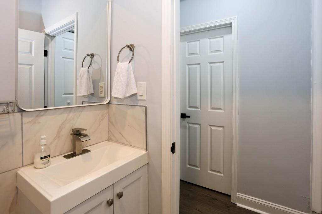 1508 Peachcrest Road Decatur, GA 30032 - Photo 19 of 26 a bathroom with a sink and vanity