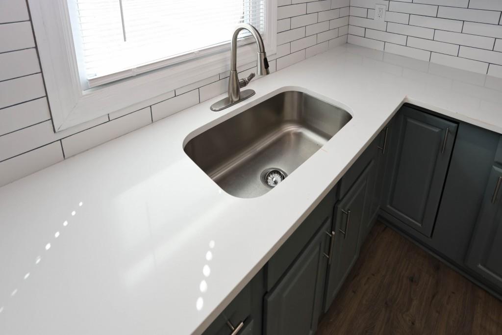 1508 Peachcrest Road Decatur, GA 30032 - Photo 8 of 26 a kitchen with a sink and cabinets