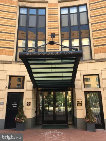 a front view of a building with glass windows