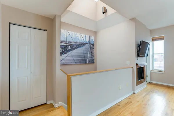 a view of kitchen with furniture and wooden floor
