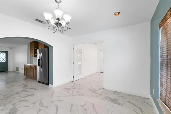 a view of a chandelier in a room