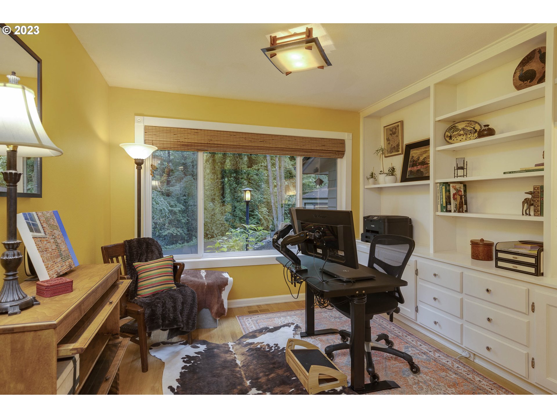 9732 Southwest 18th Place Portland, OR 97219 - Photo 14 of 45 a living room with furniture and a floor to ceiling window
