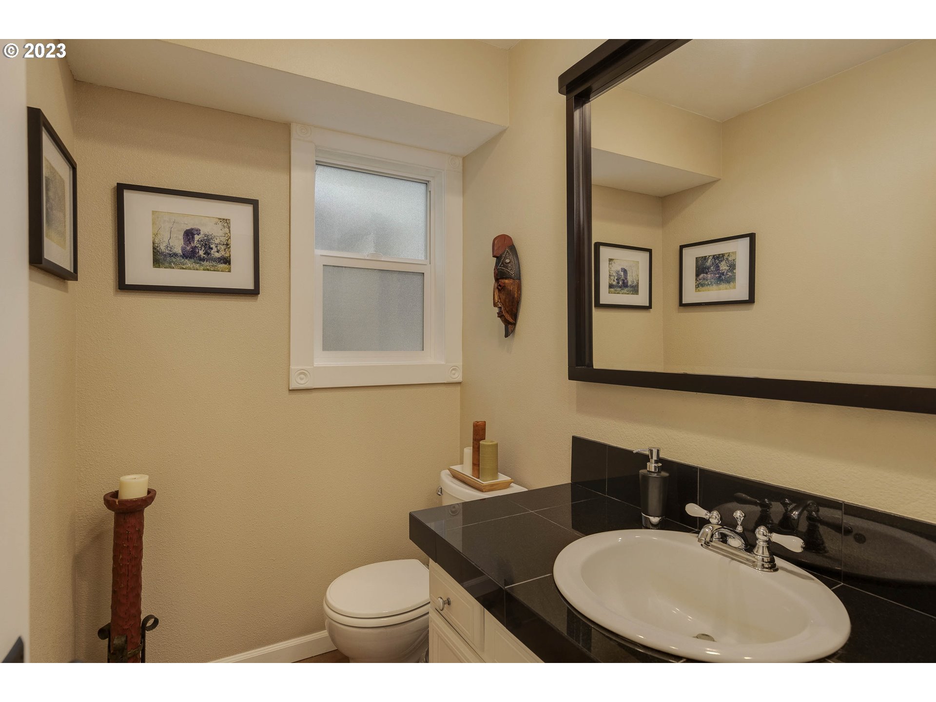 9732 Southwest 18th Place Portland, OR 97219 - Photo 20 of 45 a bathroom with a sink and a mirror