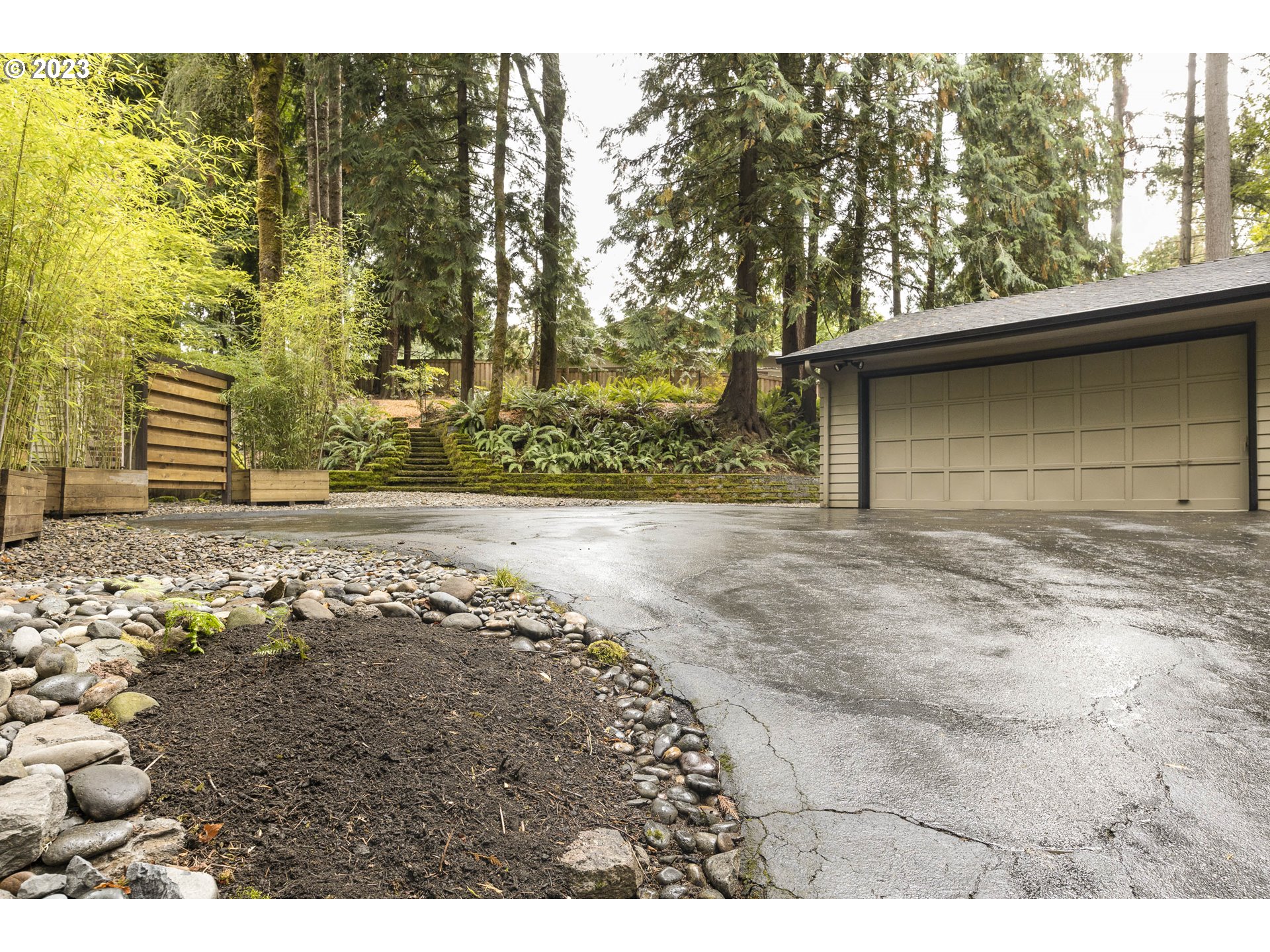 9732 Southwest 18th Place Portland, OR 97219 - Photo 3 of 45 a front view of a house with a yard