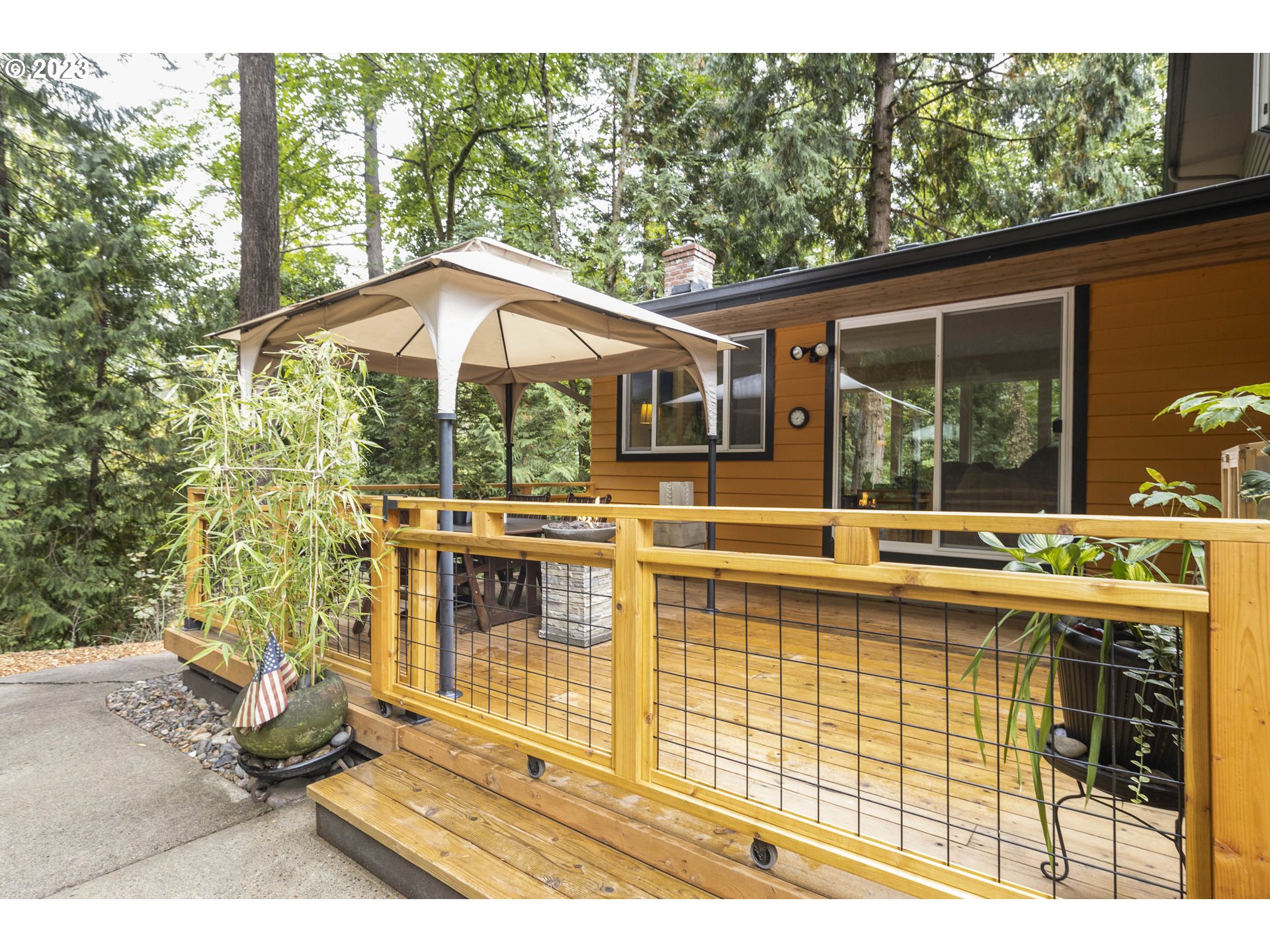 9732 Southwest 18th Place Portland, OR 97219 - Photo 32 of 45 a view of a house with a swimming pool