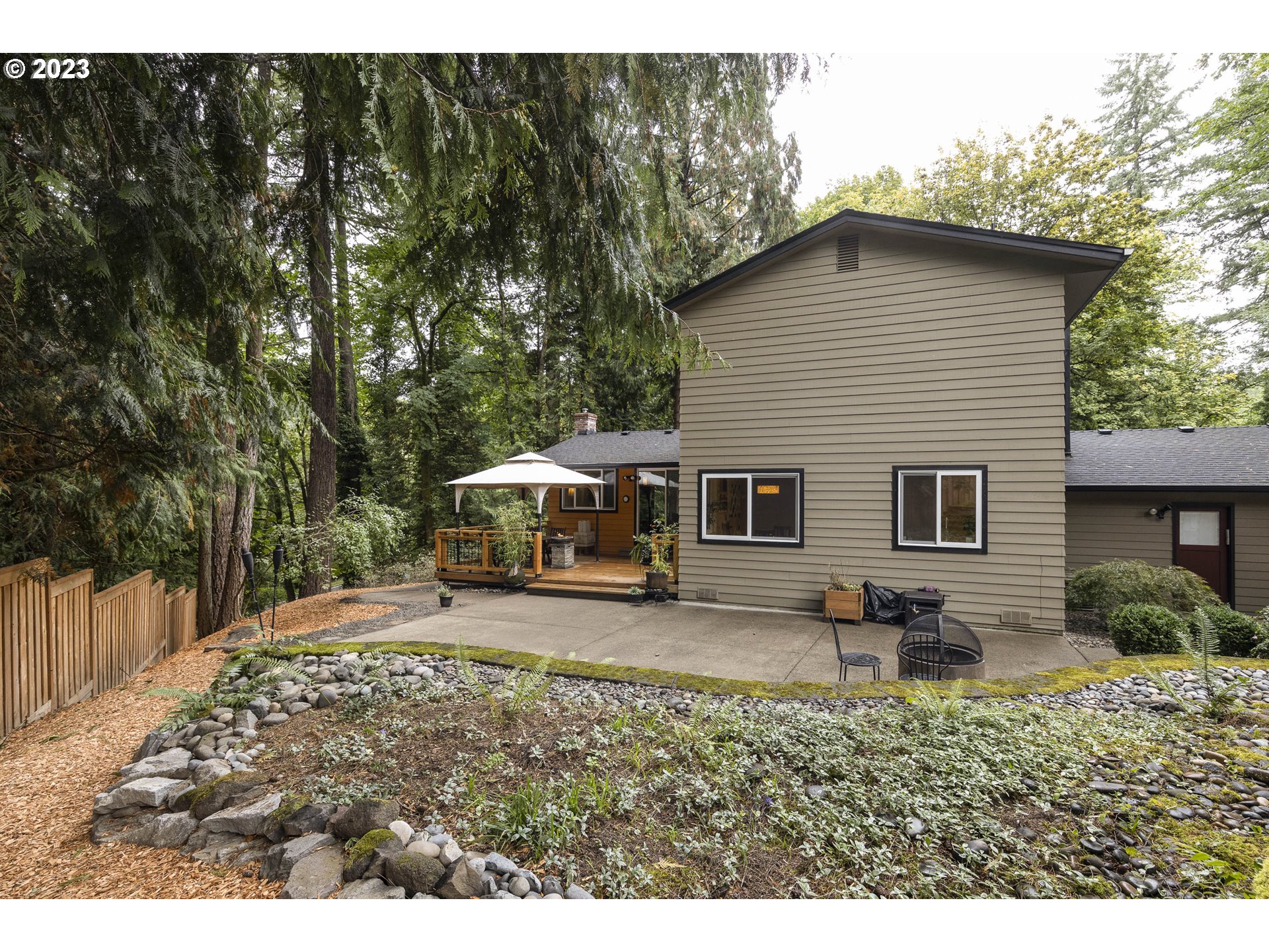 9732 Southwest 18th Place Portland, OR 97219 - Photo 34 of 45 a house view with a backyard space