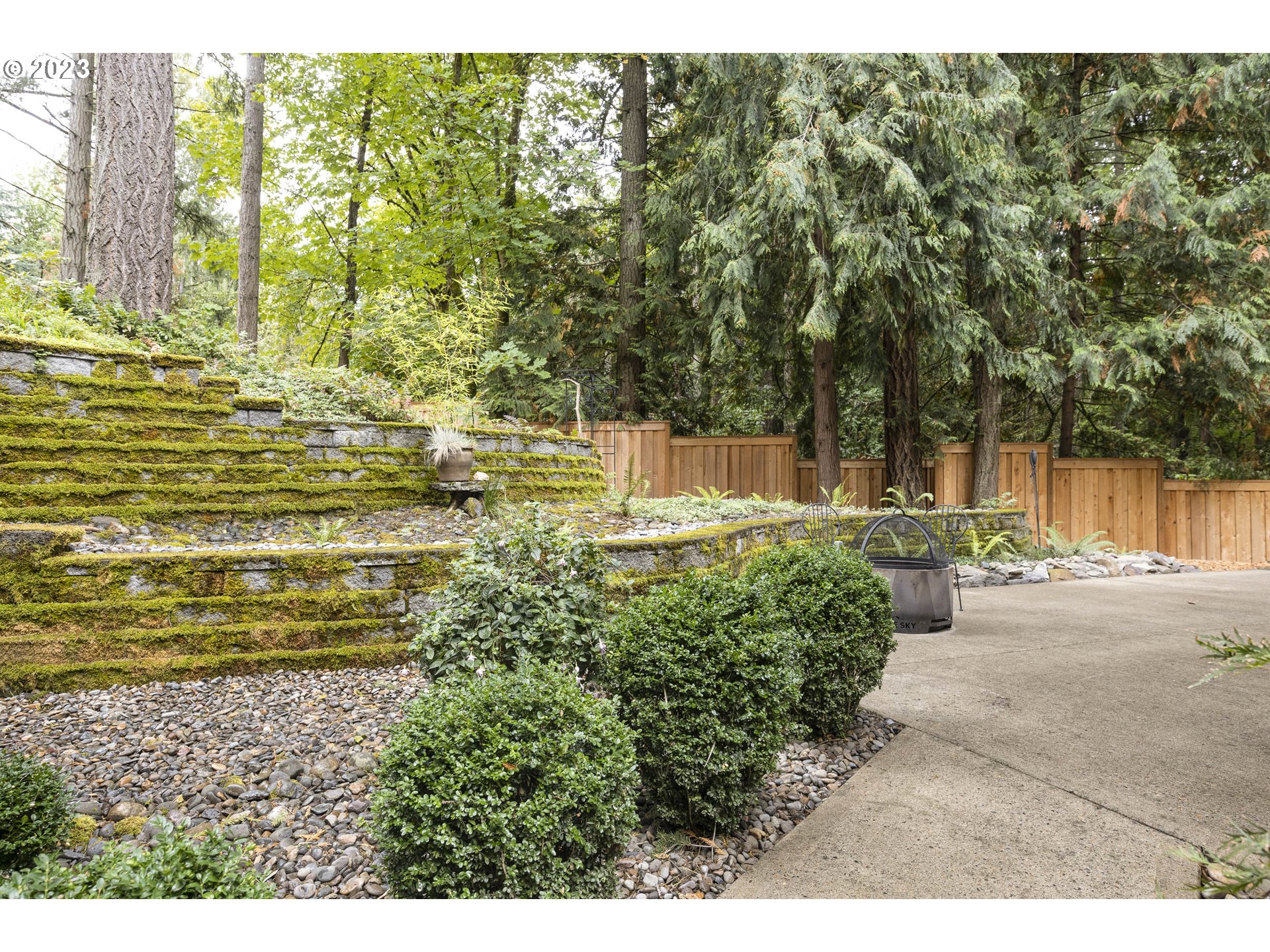 9732 Southwest 18th Place Portland, OR 97219 - Photo 38 of 45 a view of a yard with an outdoor space