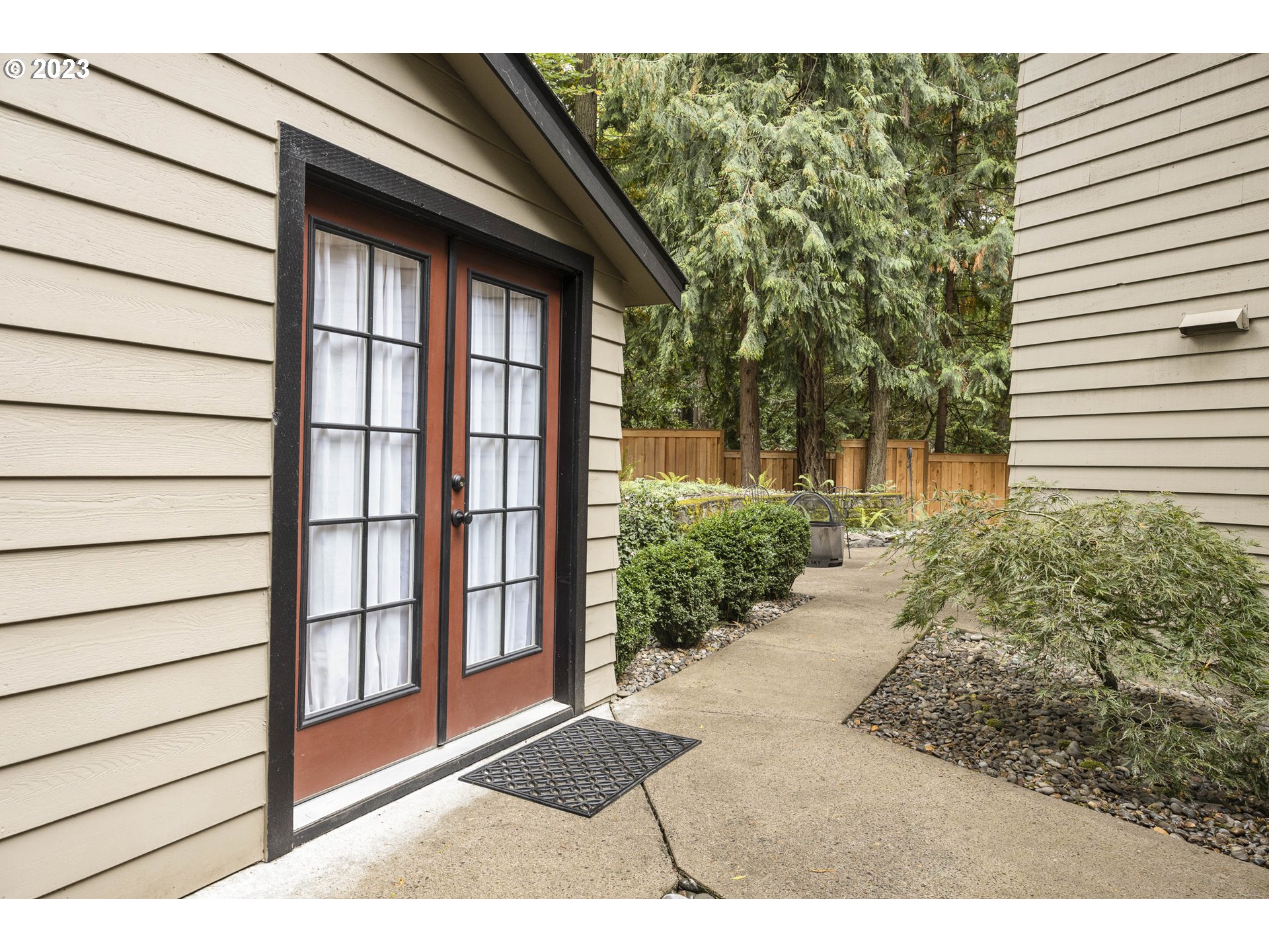 9732 Southwest 18th Place Portland, OR 97219 - Photo 40 of 45 a view of a backyard with garden