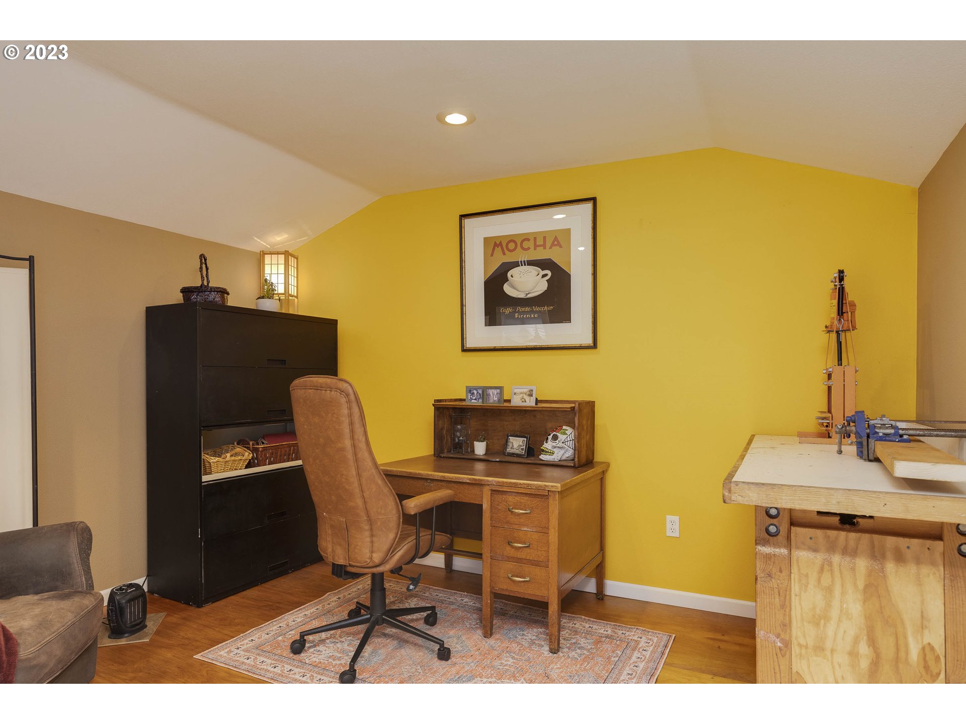 9732 Southwest 18th Place Portland, OR 97219 - Photo 41 of 45 a view of a workspace with furniture and a couch