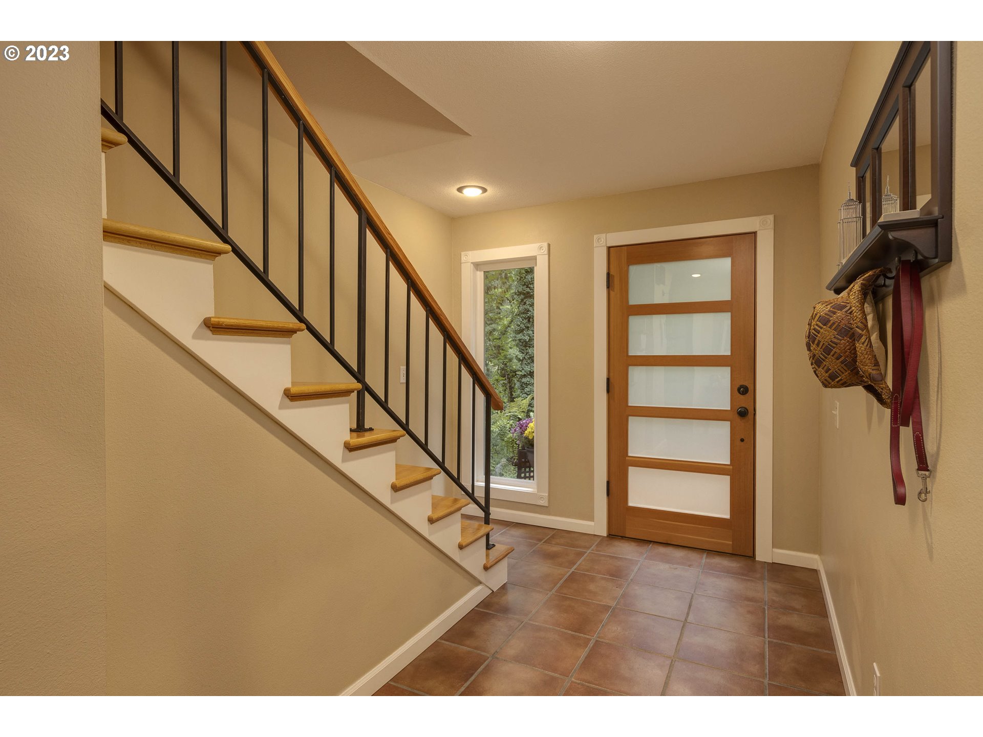 9732 Southwest 18th Place Portland, OR 97219 - Photo 9 of 45 a view of front door and stairs