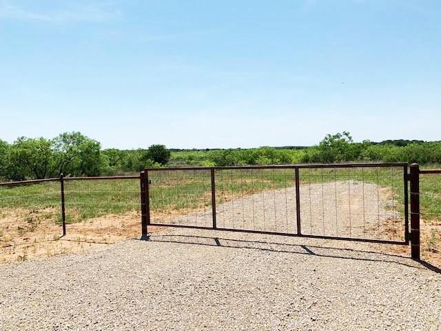 46.86-acres Stewart Ranch Road Loving, TX 76460 - Photo 1 of 17 a view of a road with a yard