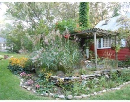 29 Scraggy Neck Road Cataumet, MA 02534 - Photo 4 of 17 a view of backyard with green space